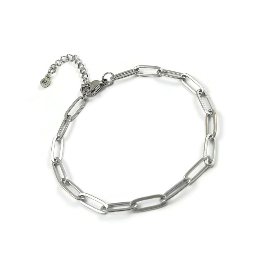 A silver paperclip chain link bracelet with a lobster clasp and an adjustable extension chain, displayed on a clean white background.